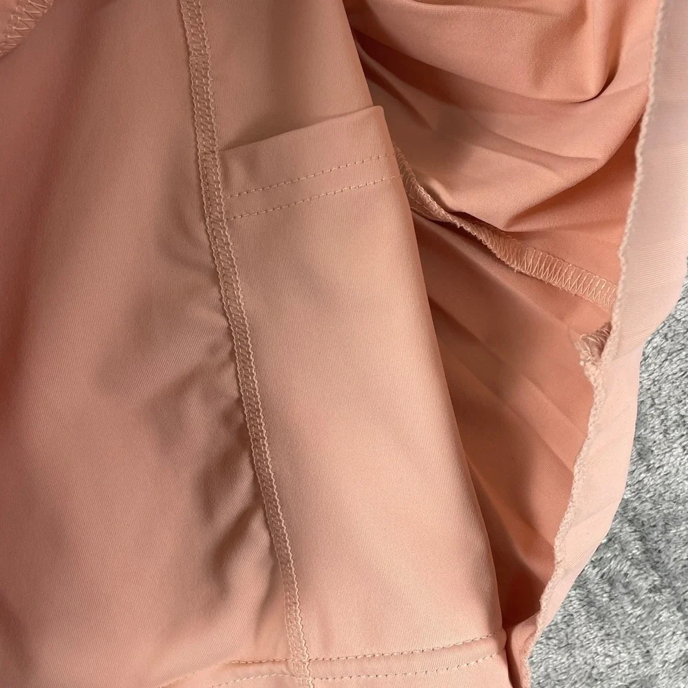 GOLD HINGE Pleated Tennis Skirt Skort Womens L Peachy Pink Preppy Pickleball EUC